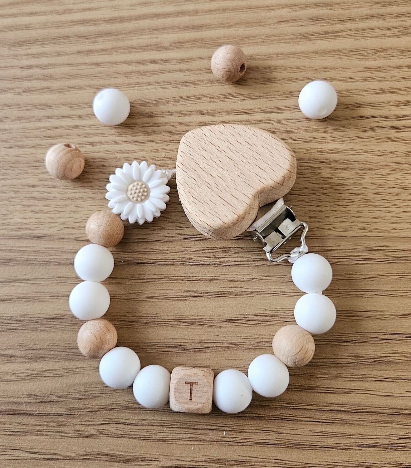 perle attache tetine